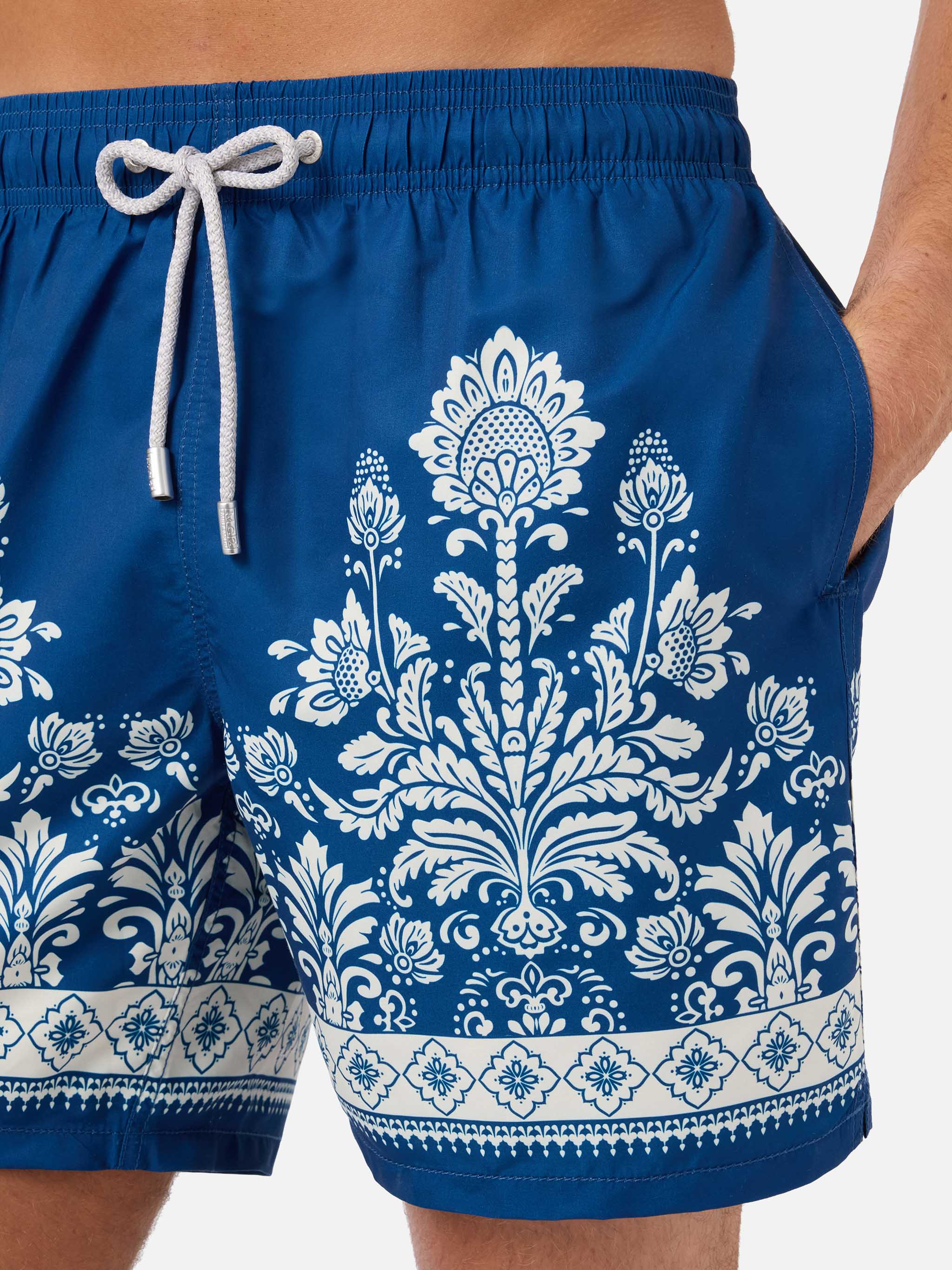 Gustavia blue swim shorts with ornamental floral print - Image 4